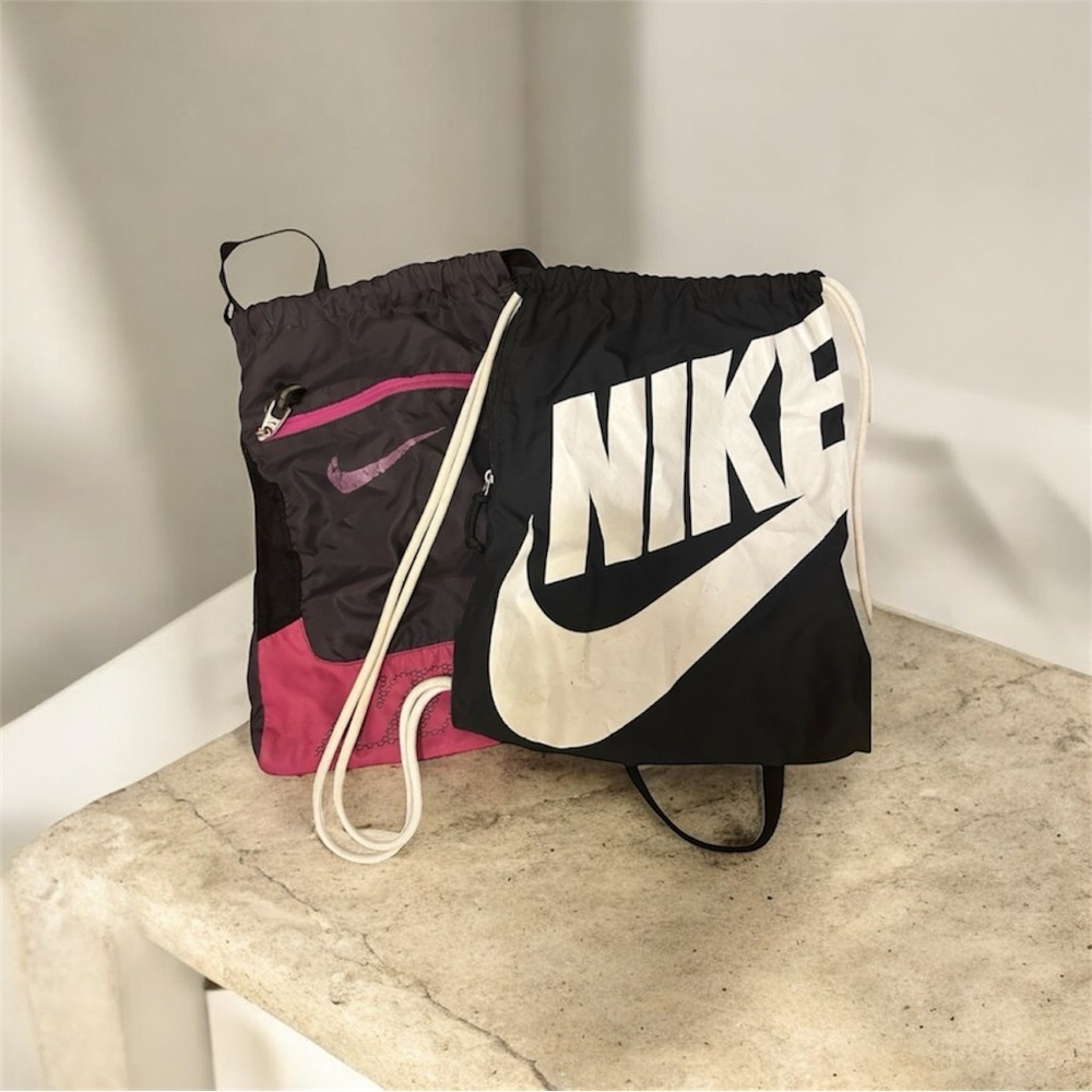 Nike Black and Pink Drawstring Backpacks